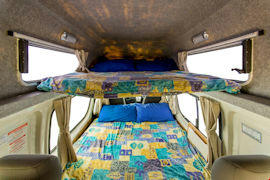 Colorful double-deck beds of Endeavour Campervan from Hippie Campers