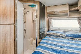 Bed area inside Jayco Conquest from Let's Go Motorhomes